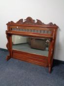 An Edwardian overmantel mirror.