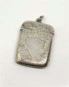 An antique silver vesta case.