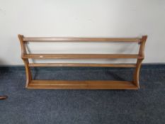An Ercol solid elm and beech Delft rack.