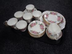 A tray of Queen Anne gilded floral tea china.