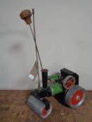 A Mamod live steam tractor.