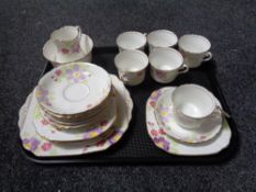A tray of Phoenix china gilded floral pattern tea ware.