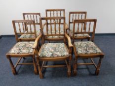 A refectory dining table on carved bulbous legs together with a set of six spindle back dining
