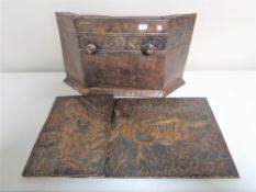 A copper Arts & Crafts fire front together with two further copper embossed panels.