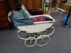 A mid 20th century coach built doll's pram
