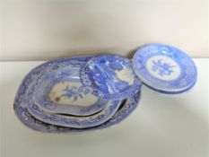 Twelve antique blue and white dinner plates and meat plates.