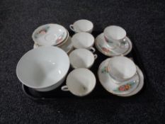 A 19 piece English bone china rose patterned tea service.