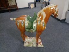 A large glazed pottery Tang style horse, height 79 cm.