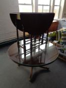 A circular inlaid mahogany pedestal coffee table together with an oak gateleg table