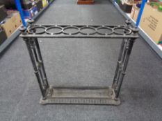 A 19th century cast iron Coalbrookdale stick stand with lift out tray,