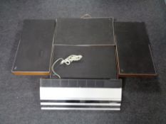 A Bang and Olufsen Beomaster 1900 together with four Beovox P30 panel speakers.