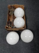 Four early 20th century hanging copper light fittings with opaque glass shades.