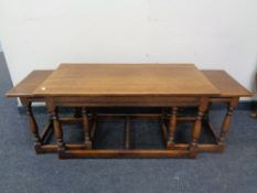 An oak coffee table fitted two beneath.