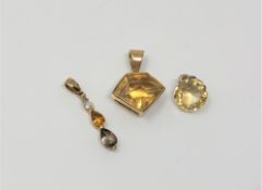 Three gold citrine pendants (3)