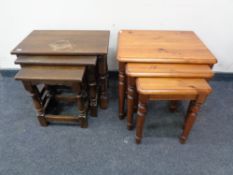 A nest of three pine tables together with a nest of three oak tables.