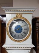 A continental painted cased longcase clock with metal dial, pendulum, no weights.