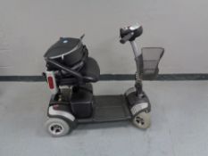 A TJA Eclipse electric mobility cart with key and charger - needs attention CONDITION