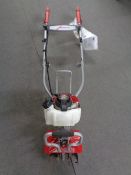 A Honda Mantis GX25 petrol rotavator.