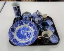 A tray of assorted china, character jugs, Willow pattern pin dishes,