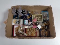 A box containing a quantity of assorted costume jewellery to include earrings, necklaces,