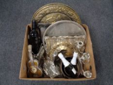 A box containing assorted plated wares, pair of brass embossed wall plaques, bottles of Asti,
