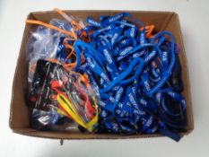 A box of visitor's lanyards