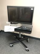 An Optelec ClearView C HD 24'' Speech TFT Video Magnifier on height adjustable trolley,