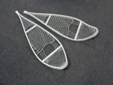 A pair of snow shoes.