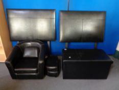 A black leather child's tub chair with stool,