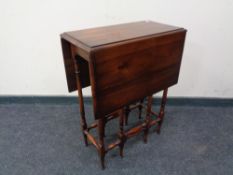 A Victorian style drop leaf table.