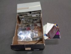 A box containing multi drawer chest containing haberdashery items, buttons, threads etc.