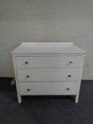 A painted three drawer chest