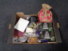 A box containing costume jewellery, solar string lights, etc.