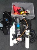 A large quantity of diving equipment to include tanks, regulators, diver's knife, weights,