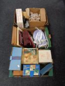Three boxes containing miscellania to include boxed glassware, framed pictures, steam iron system,