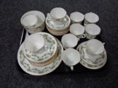 Thirty six pieces of antique Phoenix bone tea china