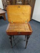 A 19th century inlaid walnut ebonised work table