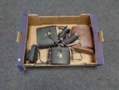 A box of four sets of assorted binoculars (three cased),