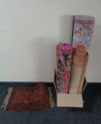 A fringed Persian prayer rug and four further contemporary rugs