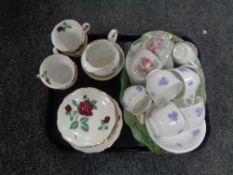 A tray of decorative glass scalloped edge dishes, tea china,