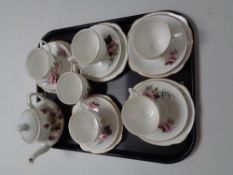 A tray containing six Duchess bone china trios together with an antique china teapot.
