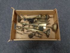 A box of brass companion stands and pieces
