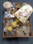 A palate containing five boxes of assorted glassware and china together with a glazed pottery table
