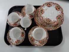 A tray containing 31 pieces of antique English floral patterned tea china.
