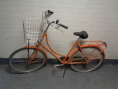 A lady's Velolux shopper bike (rear wheel locked)