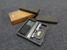 Four cased micrometers