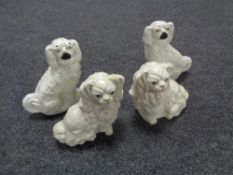 Two pairs of early twentieth century dog figures