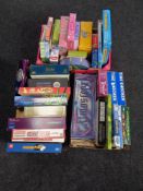 Three boxes of board games, Monopoly, Who Wants to be a Millionaire, Harry Potter books,