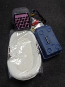 A car cycle carrier together with a Moses basket and two pet carriers