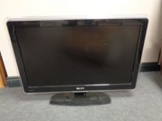 A Samsung 32'' LCD TV together with a Phillips 37'' LCD TV with remotes and continental wiring.